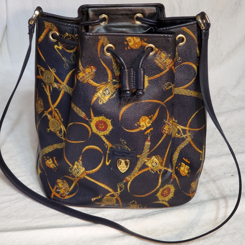 Mark Cross Bucket Bag. Leather. Black & Gold. America's First Luxury Brand.